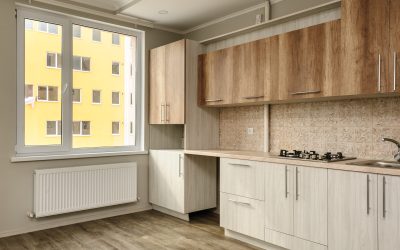 Brand new unfinished yet modern beige kitchen, minimalistic clean design
